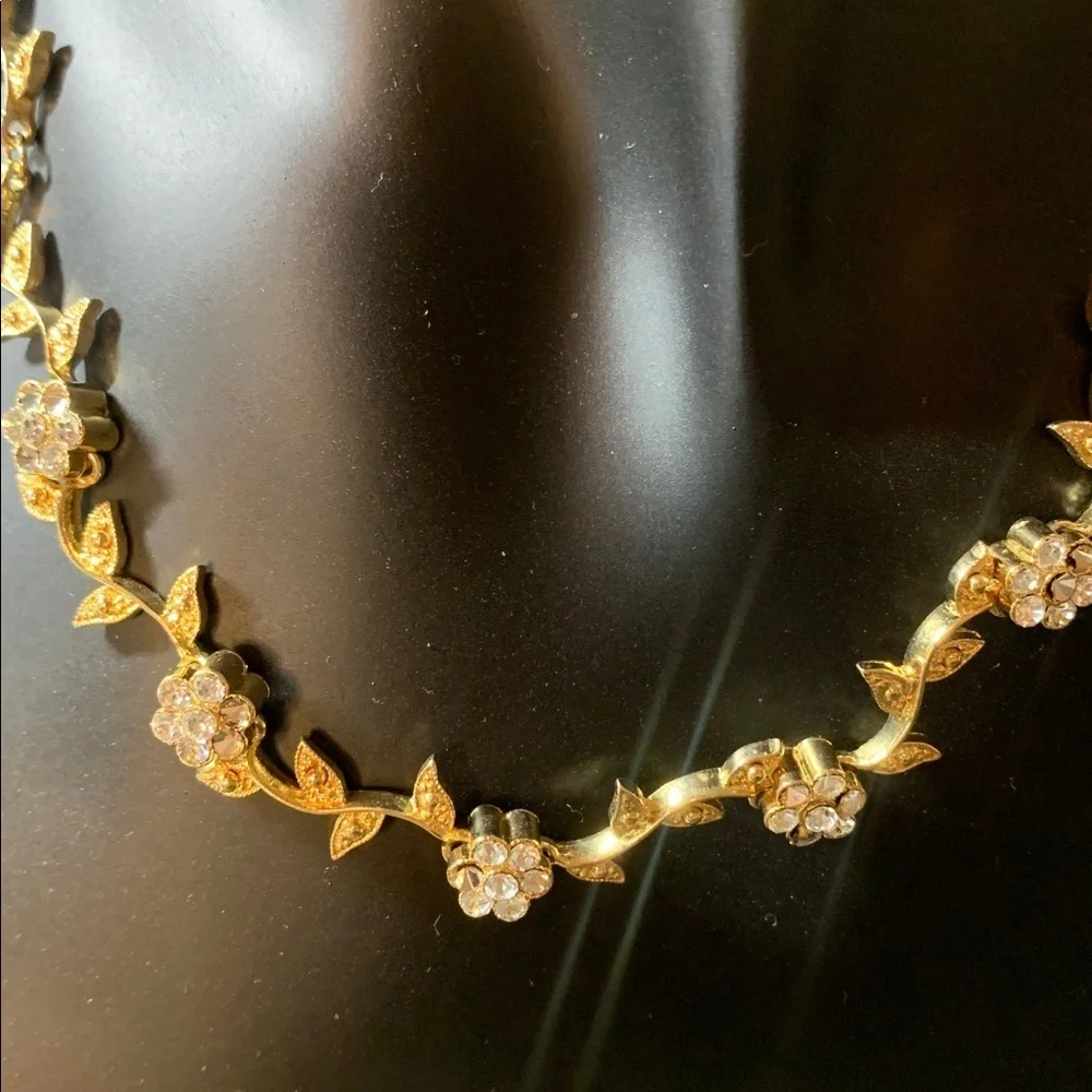 Elegant Gold tone and diamond Floral Necklace